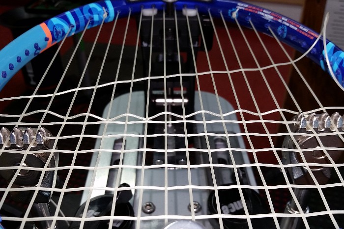 racket being strung